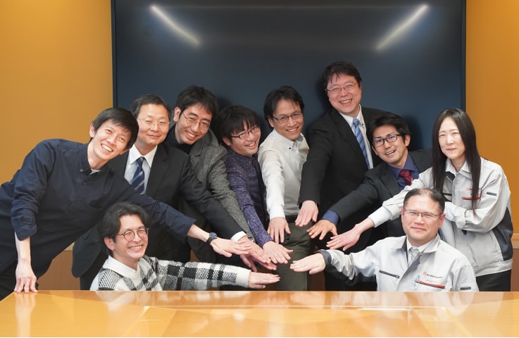 JAXAと大学の研究者と当社社員