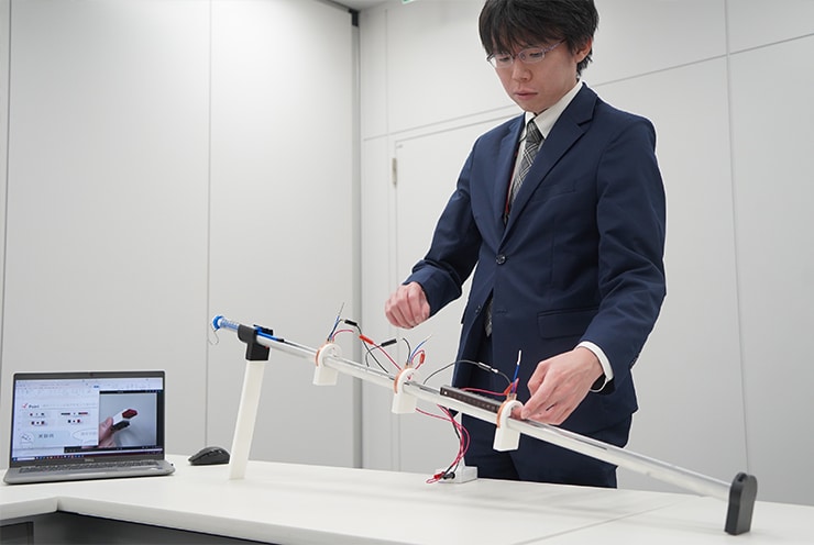 開発を担当したチームリーダーの上野 